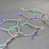 Миниатюра фото гирлянда нить 10м разноцветная 220в, 100 led, провод белый каучук, ip65 ltc ll100-8-2m | 220svet.ru