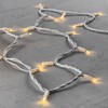 Миниатюра фото гирлянда нить 10м тепло-белая 24в, 100 led, провод белый каучук, ip65 ltc ll100-8-1ww | 220svet.ru